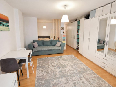 Garsoniera de vanzare 47 mp utili cu gradinuta de 17 mp